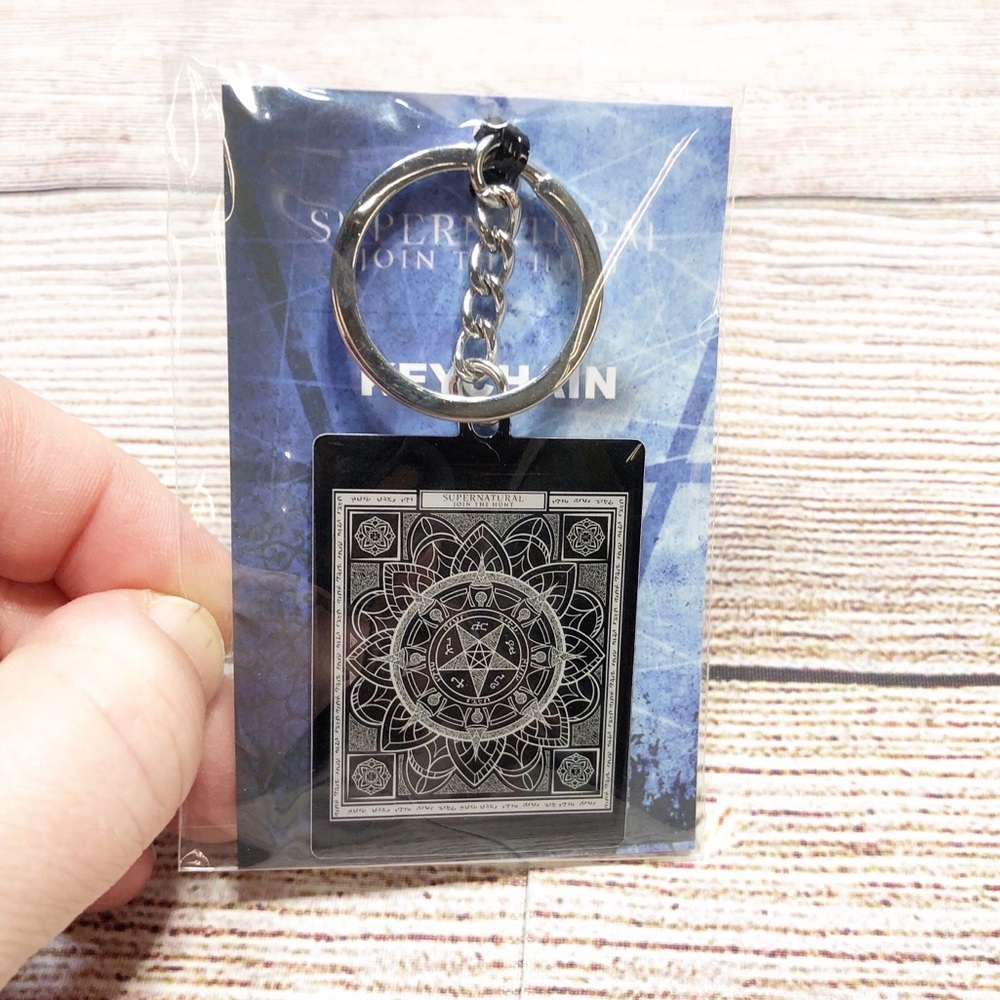 Silver Keychain with Intricate Design